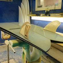 glass on twin keel fish surfboard