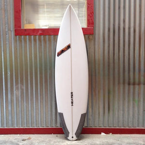 high performance rounded pin tail surfboard