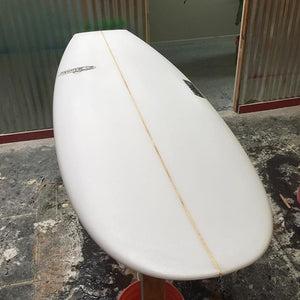 mini simmons quad fin surfboard